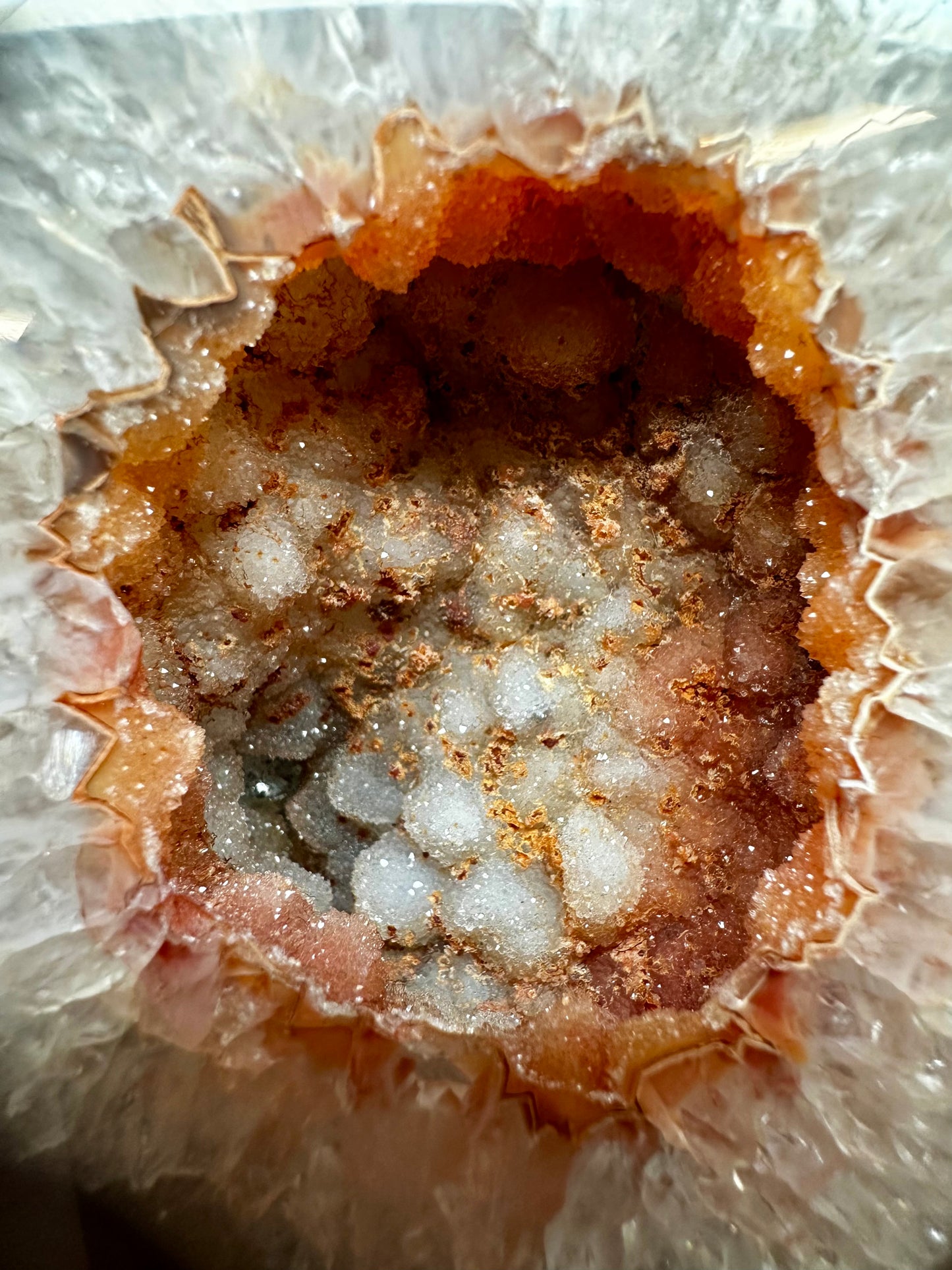 Natural Agate Geode on a metal stand. 16 cm tall.