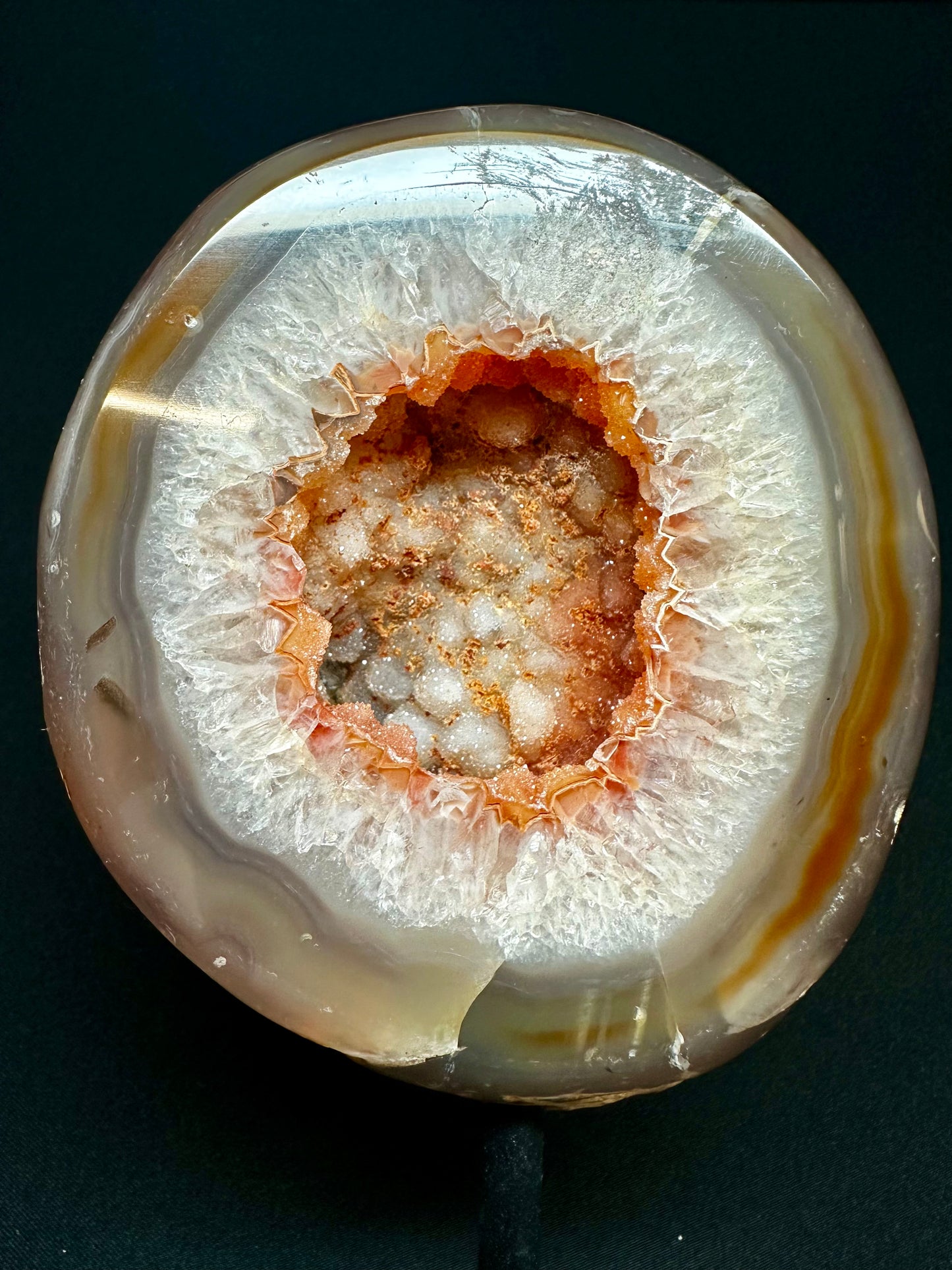 Natural Agate Geode on a metal stand. 16 cm tall.