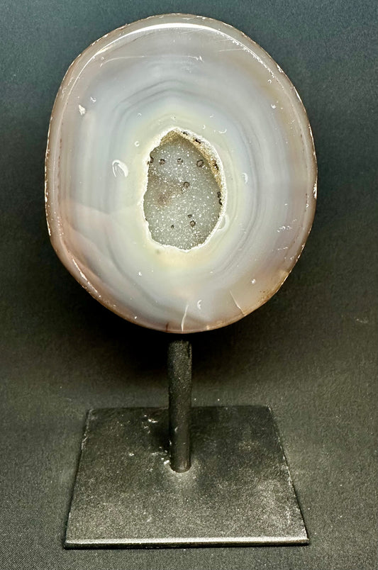 Natural Agate Geode on a metal stand. 19.5 cm tall.