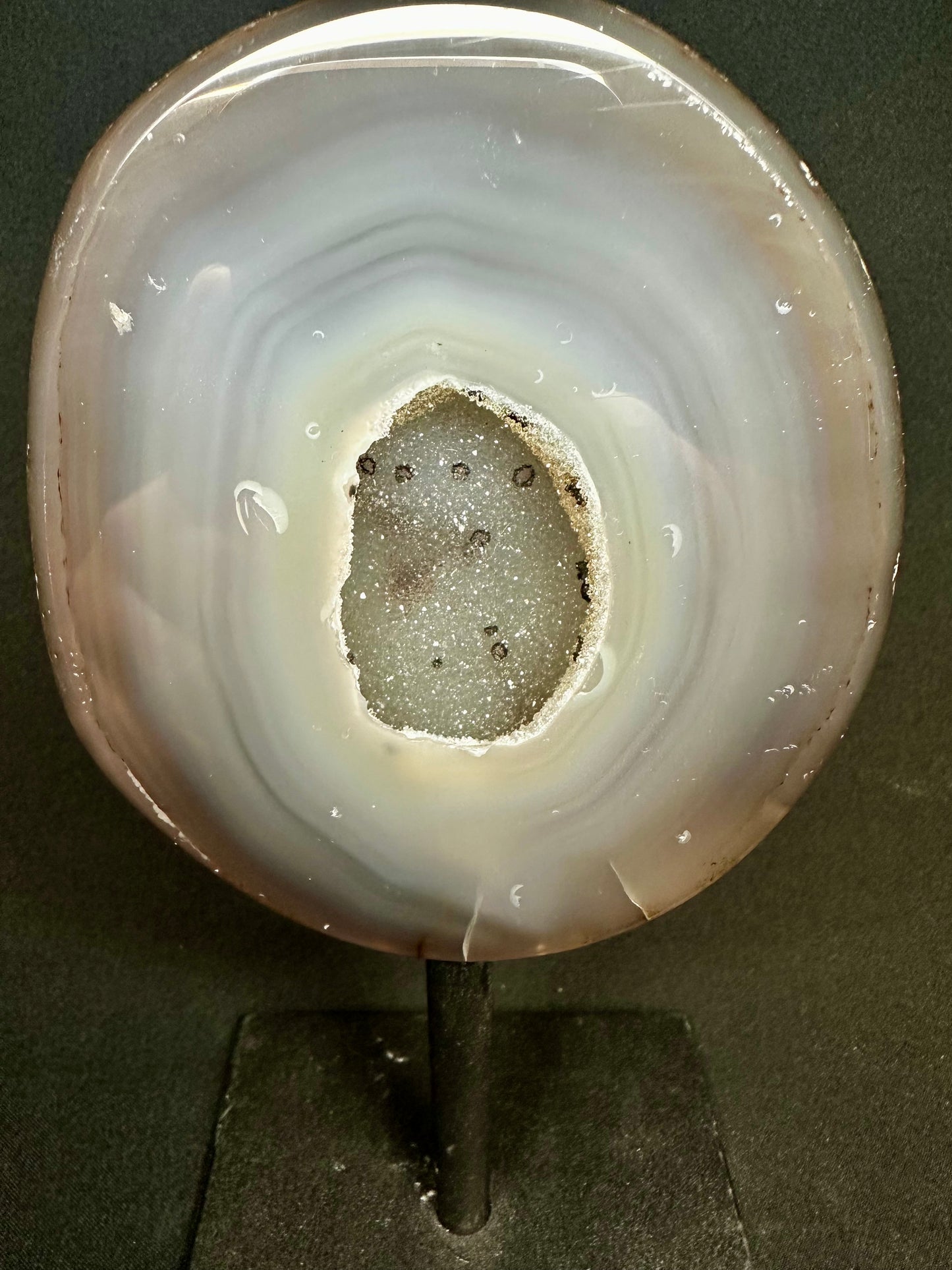 Natural Agate Geode on a metal stand. 19.5 cm tall.